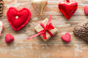 Image showing christmas gift and heart shaped decorations