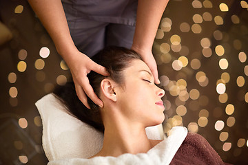 Image showing woman having head massage at spa