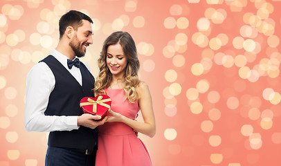 Image showing happy couple with gift on valentines day