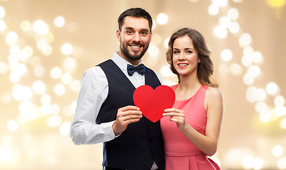 Image showing happy couple with red heart on valentines day