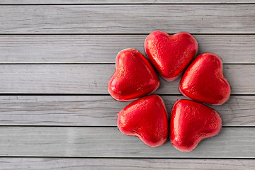 Image showing close up of red heart shaped chocolate candies