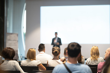 Image showing Male business speaker giving a talk at business conference event.