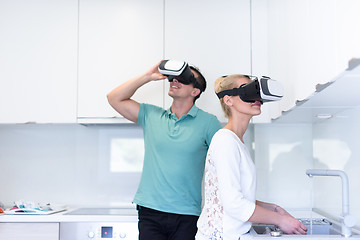 Image showing young couple using VR-headset glasses of virtual reality