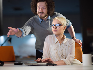 Image showing designers in the night startup office