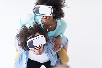 Image showing multiethnic couple getting experience using VR headset glasses