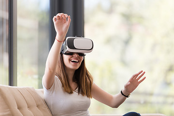 Image showing woman using VR-headset glasses of virtual reality