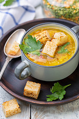 Image showing Pea soup with smoked ribs and croutons in a bowl.