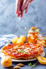 Image showing Traditional upside-down pie with apricots.