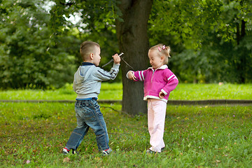 Image showing Boy and girl in the forest