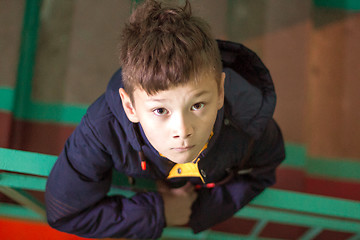 Image showing Boy with cute eyes looking at camera