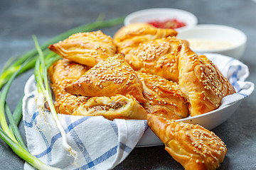 Image showing Homemade samosas with meat and spices.