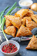 Image showing Samosas with meat sprinkle with sesame seeds.