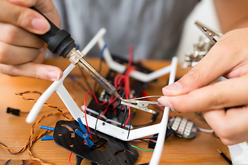 Image showing Welding the parts of drone