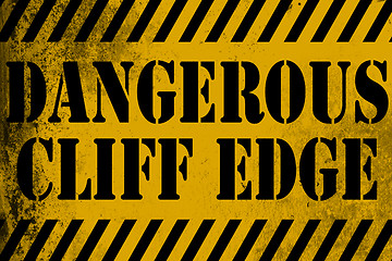 Image showing Dangerous cliff edge sign yellow with stripes