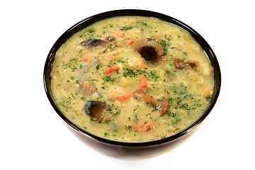 Image showing Mediterranean Vegetable soup with added yogurt and egg 