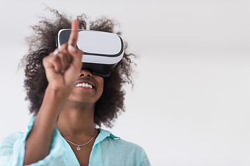 Image showing black girl using VR headset glasses of virtual reality