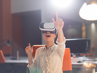 Image showing businesswoman using VR-headset glasses of virtual reality