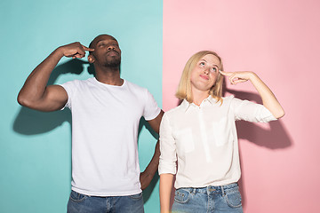 Image showing Man and woman posing at studio during quarrel