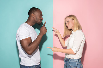 Image showing Man and woman posing at studio during quarrel