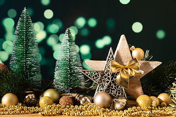 Image showing Christmas decoration wooden star with fir trees