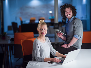 Image showing designers in the night startup office