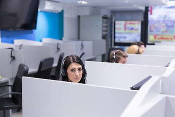 Image showing female call centre operator doing her job