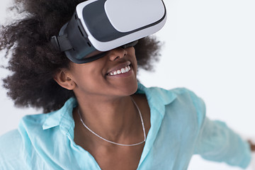 Image showing black girl using VR headset glasses of virtual reality