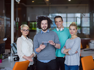 Image showing group of Business People Working With Tablet in startup office