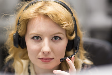 Image showing female call centre operator doing her job