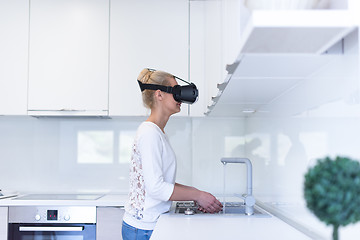 Image showing woman using VR-headset glasses of virtual reality