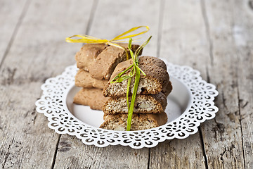 Image showing Fresh Italian cookies cantuccini on white plate on ructic wooden