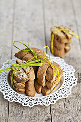 Image showing Fresh homemade Italian cookies cantuccini stacked on white plate
