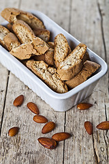 Image showing Cookies cantuccini with almond seeds  in white ceramic bowl clos