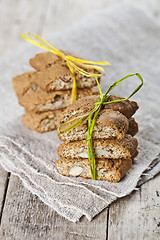 Image showing Fresh Italian cookies cantuccini with almond seeds on linen napk