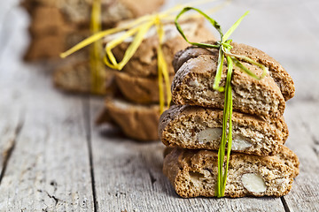 Image showing Fresh homemade Italian cookies cantuccini with almond seeds on r