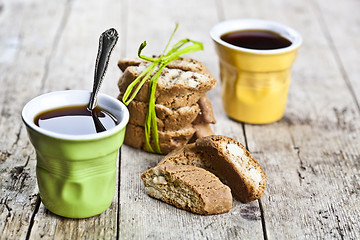 Image showing Two cups of coffee and fresh Italian cookies cantuccini with alm