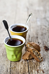 Image showing Two cups of coffee and fresh Italian cookies cantuccini with alm