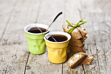 Image showing Two cups of coffee and fresh Italian cookies cantuccini with alm