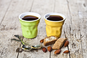 Image showing Two cups of coffee, fresh Italian cookies cantuccini and almond 