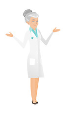 Image showing Caucasian confused doctor with spread arms.