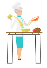 Image showing Senior caucasian chef cook preparing food.