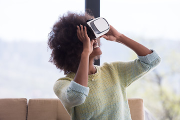 Image showing black woman using VR headset glasses of virtual reality