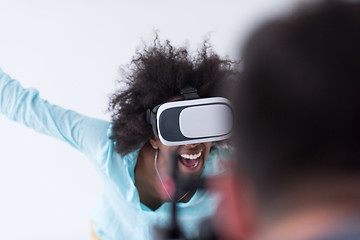 Image showing black girl using VR headset glasses of virtual reality