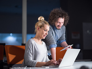 Image showing designers in the night startup office