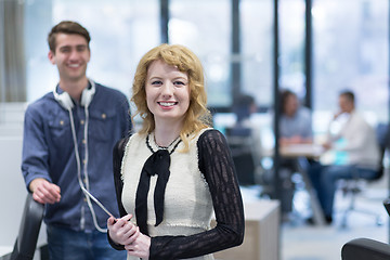 Image showing Business People Working With Tablet in startup office