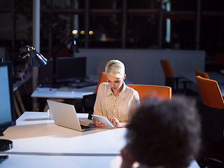 Image showing designers in the night startup office