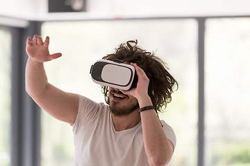 Image showing man using VR-headset glasses of virtual reality