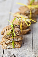 Image showing Fresh homemade Italian cookies cantuccini with almond seeds on r