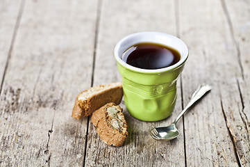 Image showing Cup of coffee, fresh Italian cookies cantuccini with almond seed