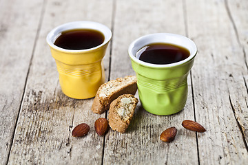 Image showing Two cups of coffee, fresh Italian cookies cantuccini and almond 